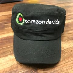 Black cadet hat with Corazon de vida and logo embroidered on front in white