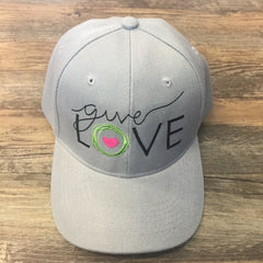 Khaki cap with "give love" embroidered on the front 