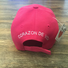 Pink 6 panel cap with Corazon de Vida embroidered on the back
